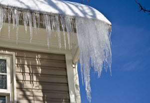 Corner of roof with large ice dam