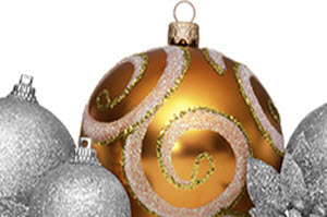 Gold decorative ornament in the middle of silver sparkly Christman decorations