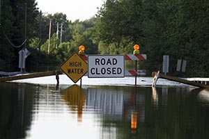 A flooded street closed off