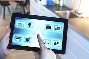 A mobile home owner remotely controlling home with tablet