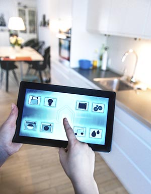 A mobile home owner remotely controlling home with tablet